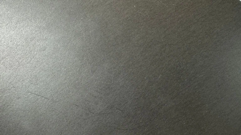 Bronze powder composite liner surface for heim joints, with multi-layer copper-backed structure