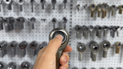 GIF of a rod end where the ball rotates very smoothly with the thumb, showing minimal resistance typical of F3 torque level