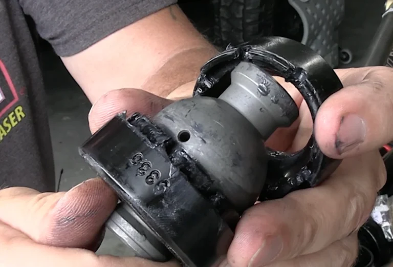Align the ball and bushings