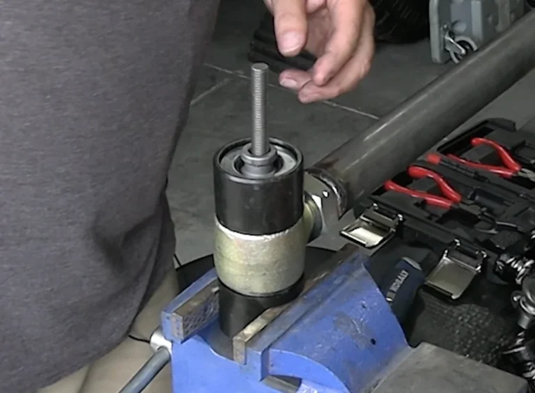Install the tapered sleeve and washer