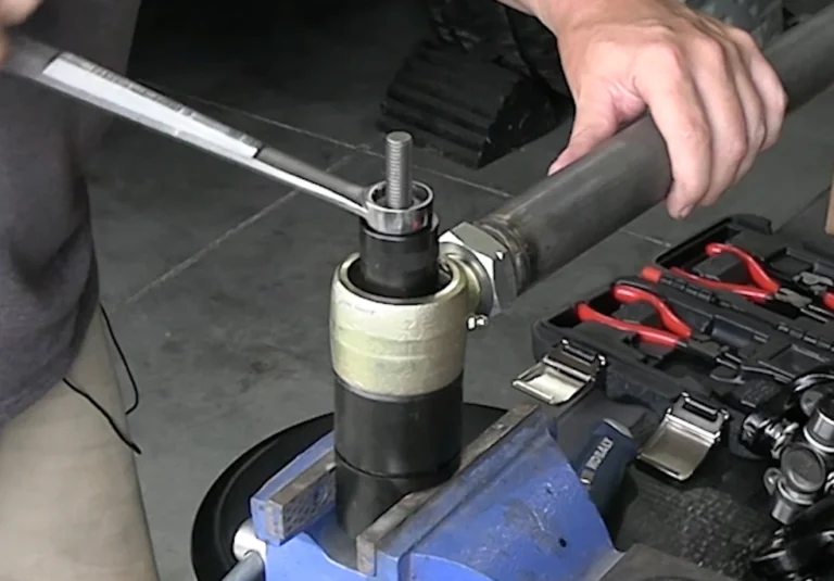 Press the bushing down into the tarpered sleeve